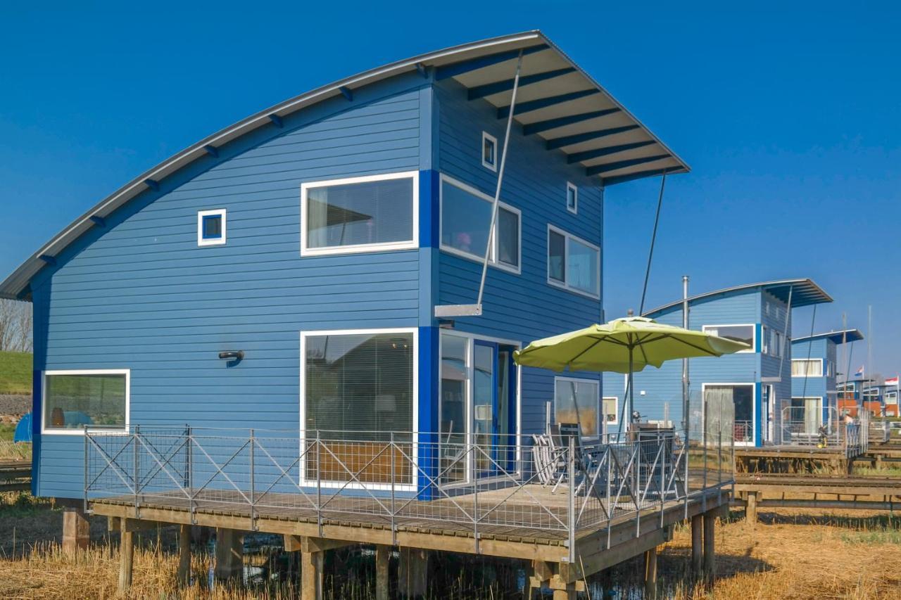 6 Pers. Waterfront Home Seeblick, Equipped Stilt House On The Water Anjum Exterior photo